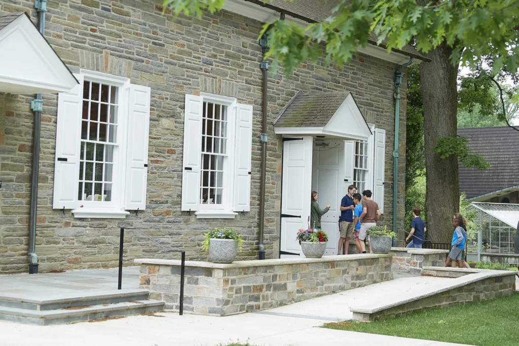 Photo of students entering our Quaker Meeting House