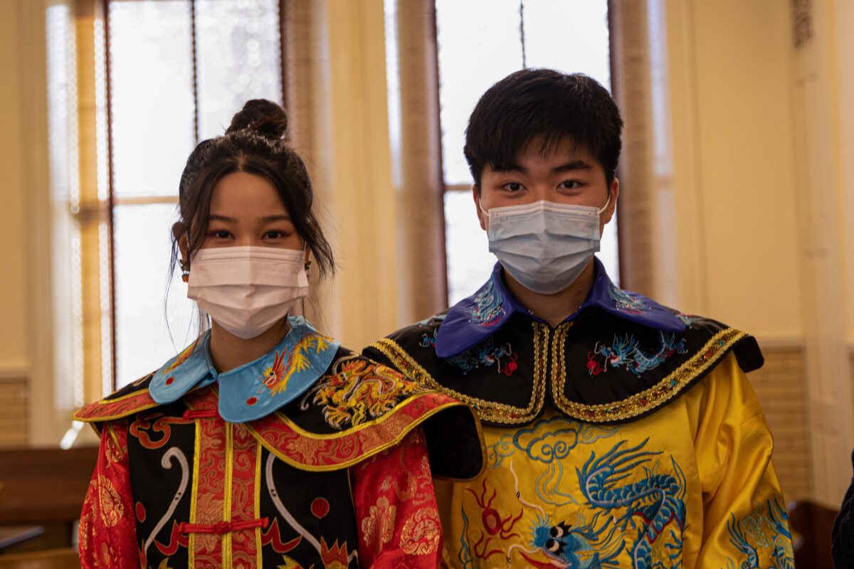 man and woman wearing mask