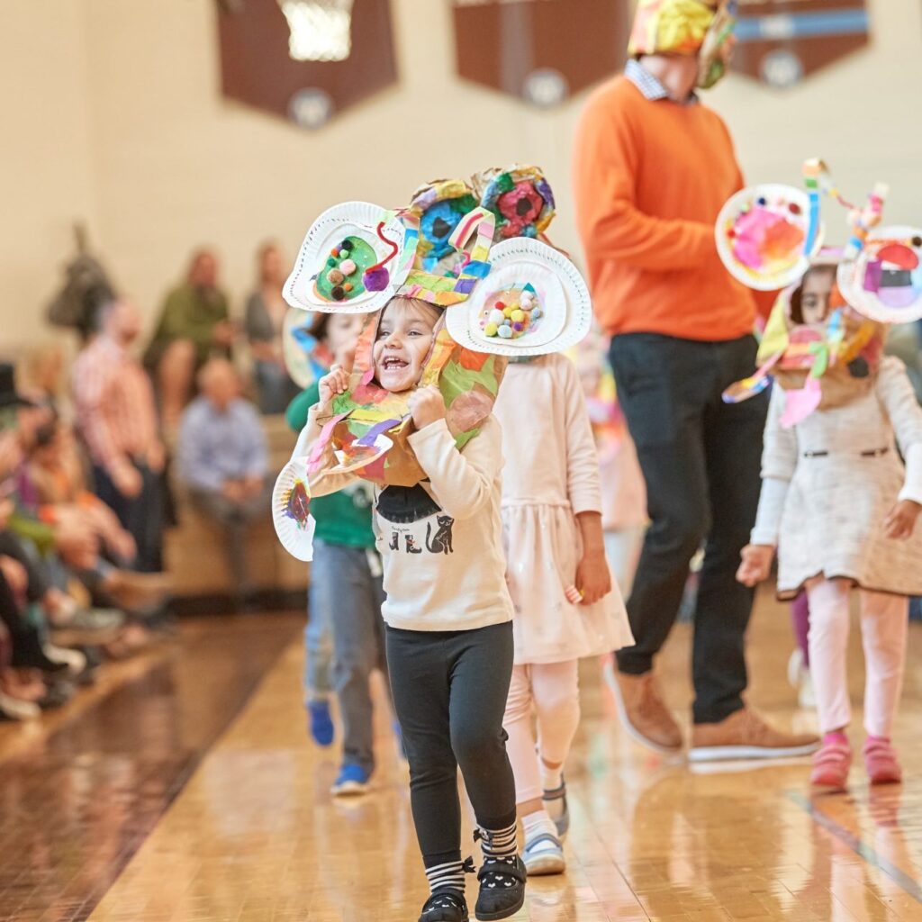 Lower School students display masks made in art class
