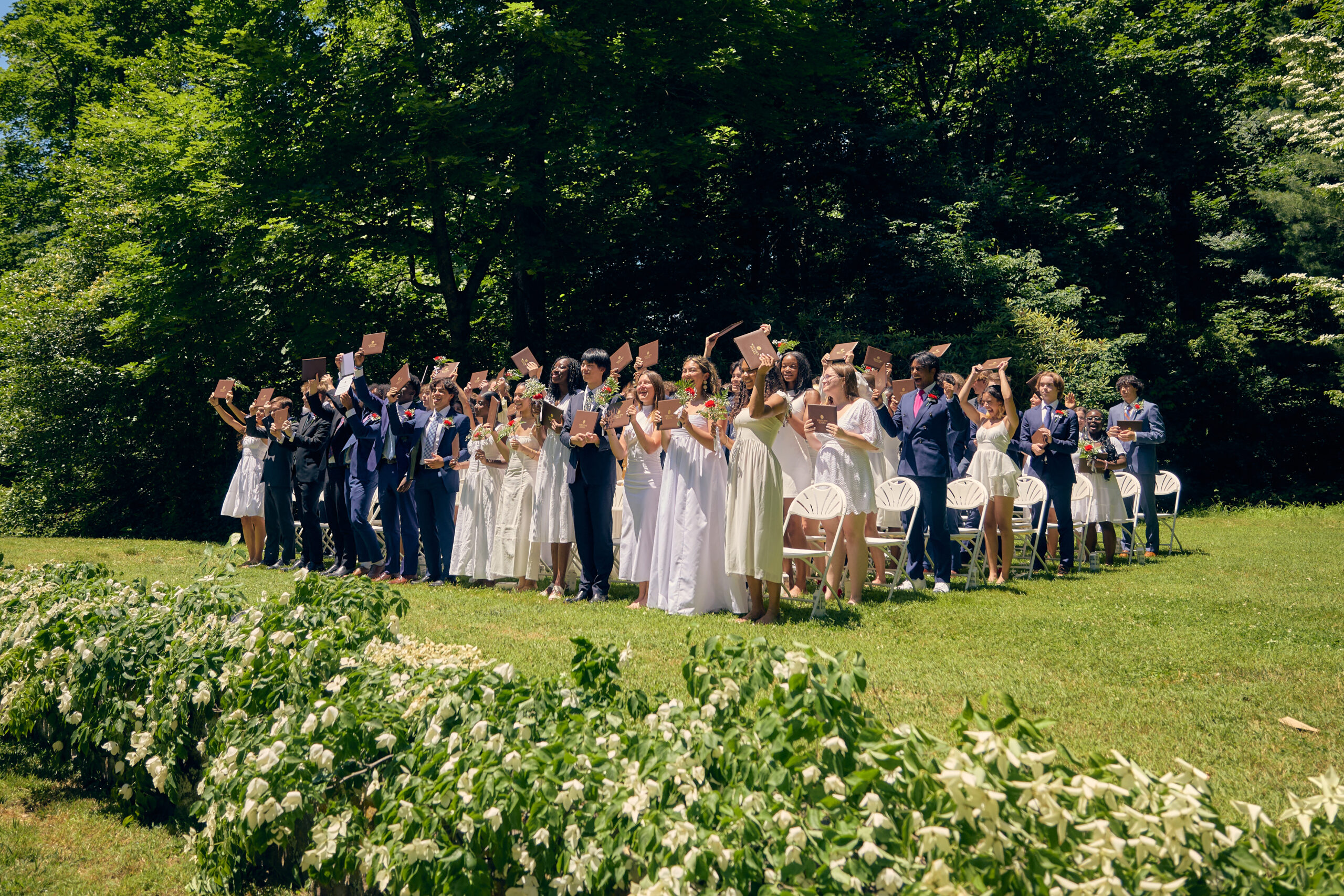 class of 2024 celebrating the end of their commencement ceremony